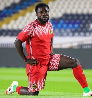 Albert Amoah paths away with Kotoko