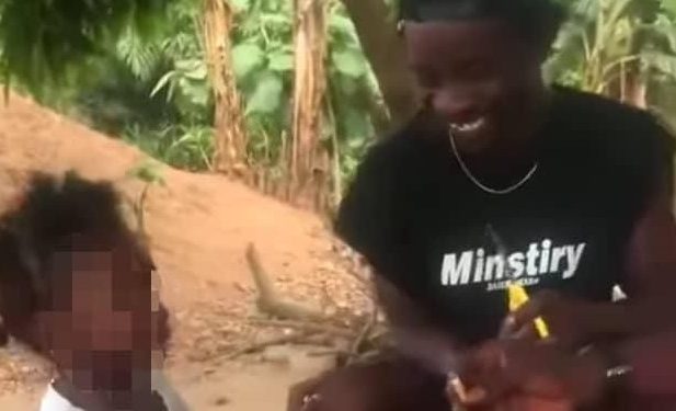 Police investigate viral video of man forcing a child to smoke